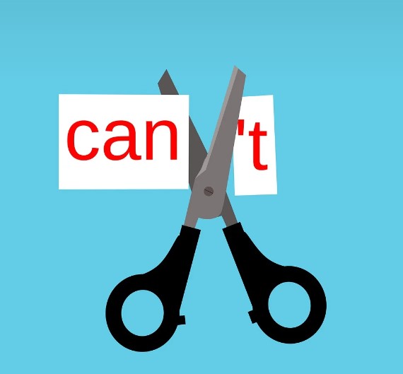 scissors cutting t off the word can't